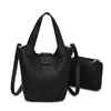 Bolsos para Mujer Bolso de Mano Suave de Cuero PU 2025 Nueva Moda Ins Bolso Cubo Casual Más Fácil de Combinar Bolso de Hombro Cruzado