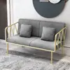 Sofá de hierro dorado de lujo simple moderno tienda de ropa de sofá silla de sofá individual de moda en internet combinación de sofá y mesa de café para sala de estar