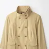Comercio exterior transfronterizo al por mayor ropa de mujer 2026 otoño nuevo moda estilo europeo y americano color liso con decoración de bolsillo gabardina de cuello alto
