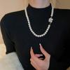 Collar de perlas geométricas con flores incrustadas de diamantes de sentido avanzado, elegante, ligero, de lujo, cadena de lana, estilo francés, collar retro, otoño e invierno.