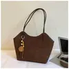 Nova bolsa tote estilosa e moderna para mulheres em 2026, apresentando um design minimalista, uma vibe descontraída e um visual chique e moderno