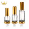Venta al por mayor de fábrica 20 ml Botella de vidrio con fondo transparente 30 ml Botella de spray para aceites esenciales 50 ml Botella roller para aceites esenciales