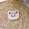 Pinzas para el cabello sin costuras con forma de oso lindo al por mayor para flequillo y cabello lateral, con diseño de cinta mágica, estilo de caricatura adorable y sirviendo como accesorio para el cabello