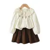 Nuevo Conjunto de Primavera y Otoño para Niñas: Conjunto de Dos Piezas de Camisa de Manga Larga y Falda Corta con Cuello de Encaje Dulce y Lindo, Ropa Infantil Transfronteriza