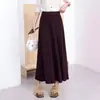Esta falda plisada de punto gris presenta un corte súper favorecedor y es una falda larga nueva de estilo coreano, versátil, para mujer, perfecta para la temporada otoño/invierno 2026