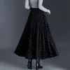 Falda midi floral de moda y elegante para mujer, nuevo modelo otoño 2026, de cintura alta, que cubre la cadera, falda larga elegante y versátil con un dobladillo amplio.