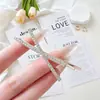 Presilha de cabelo em formato de cruz com strass, estilo Instagram, para mulheres, para arrumar o cabelo das laterais e da frente, presilha para franja, acessório de cabelo de alta qualidade
