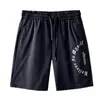 Shorts de verão com estampa de letras retrô americana Chao Lunbu para homens, calças casuais masculinas versáteis de corte solto, shorts esportivos na altura do joelho