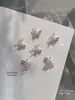 Nuevo taladro de uñas de circón Qiansi Mengdie decoraciones de alas de mariposa de doble ala tridimensionales para uñas venta al por mayor