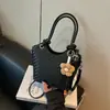 Bolso tejido de moda transfronterizo 2026 verano nuevo versátil para el trabajo personalizado bolso cruzado casual moderno