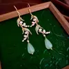 Aretes de Hoja con Zirconia de Aguja Plateada y Goteo de Aceite, Lujo Ligero, Gama Alta, Elegantes, Modernos, Exquisitos, Versátiles, Venta al por Mayor de Aretes para Mujer