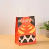 Bolsa de regalo creativa de dibujos animados para Halloween Bolsa de papel Kraft Bolso de mano para dulces Bolso de mano para fiesta navideña con mano de regalo