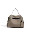 Bolso de Textura Suave de Cuero para Mujer 2026 Principios de Primavera Versátil Bolso de Madre Color Sólido Gran Capacidad Bolso de Hombro Cruzado Elementos