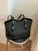 Bolso de diseño tejido de nicho para mujer, bolso de mano grande de moda primavera/verano 2026, bolso de hombro casual de moda