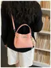 Bolsa Tote Pequena de Cor Sólida para o Dia a Dia Feminina 2026 Novo Estilo Fashionável Acabamento de Luxo Elegante Bolsa de Ombro Único Transversal Estilo Balde