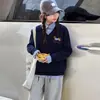 Conjunto Infantil Grande para Meninas Outono 2026 Novo Estilo Gola Bordada Camisa Polo Top Calça Casual Conjunto de Duas Peças Estiloso Fashion