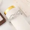 Distrito Lu moda alta gama hueco cabeza de leopardo pulsera hebilla de personalidad pulsera de apertura joyería fabricantes venta directa al por mayor