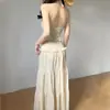 Traje de baño para vacaciones sexy en la playa Pure Desire para mujer, bikini de cuello en V con tiras al cuello, conjunto de tres piezas, traje de baño con falda de nudo en la cintura
