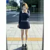 Atuendo juvenil de estilo preppy, un conjunto completo de elegante traje de punto para mujer, conjunto de dos piezas de suéter y falda de otoño e invierno