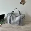 Colección de otoño 2026 transfronteriza: bolsa de viaje corta para mujer, bolsa de mano portátil, bolso de hombro, bolsa casual para la playa o piscina, bolsa para deportes y fitness