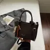 Bolsa Casual de Nicho Feminina Grande Capacidade Outono 2025 Nova Bolsa de Balde Simples Bolsa Transversal da Moda para Senhora