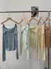 Top de punto Omalai con nudo de lazo, abalorios, hombros descubiertos y manga larga con un nuevo diseño para primavera 6557