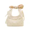 Bolso pequeño dulce y lindo para mujer, nuevo bolso de mano versátil estilo coreano para lápiz labial y monedas, adecuado para citas, bolso de hombro o cruzado, transfronterizo