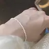 Colar de Pérolas Junxie Shijia para Bebê 2mm Alto Padrão Redondo Pequeno Arroz Levemente Luxuoso Colar 14K Joia Versátil para Mulheres