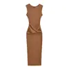 Estilo puro e sedutor, decote redondo, design sem mangas, acinturado, que molda o quadril e com detalhe cruzado, este vestido de outono é um vestido maxi que valoriza a silhueta, com fenda nas costas para um look sexy.