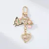 Llavero Colgante de Aleación Forma de Gota de Aceite Mariposa Corazón Ojo de Gato Perla Joyería Múltiples Opciones Disponibles Soporte para Lotes Mixtos