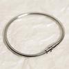 Pulseira redonda de corrente de cobra estilo vento simples micro elástica de aço inoxidável para mulheres personalidade Coringa botão de pressão joia de mão em aço titânio atacado