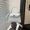 Bolso Kelly Pequeño Nuevo 2026 Color Sólido Repujado, Bolso de Mano Simple y Texturizado, Bolso Cruzado para Mujer, Bolso de Estilo Lujo Ligero para el Uso Diario