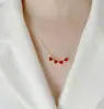 Colar Pingente Trevo de Quatro Folhas Coração Dupla Face Mais Vendido no TikTok, Design Original de Alto Padrão Estilo Francês, Corrente para Clavícula em Aço Titânio