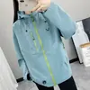 Jaqueta Feminina Outono/Inverno 2025 Corta-vento Impermeável Fashion Versátil Jaqueta Corta-vento para Casal Jaqueta para Caminhada ao Ar Livre Viagem
