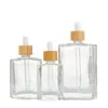Botella dispensadora de aceite esencial de vidrio transparente, gotero de punta de plástico portátil, empaque de producto para el cuidado de la piel, botella vacía, botella de perfume portátil para viajes