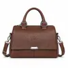 Bolso de mano transfronterizo 2026 nuevo textura de cuero suave bolso tote de hombro de alta gama retro versátil bolso de hombro para mujer