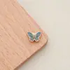 Agujero pequeño largo no se decolora aleación accesorios DIY mariposa esmalte quemado azul cloisonné mariposa flor de amor accesorios para collar
