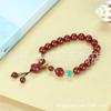 Pulsera de cinabrio rojo al por mayor con alto contenido de arena de oro púrpura de 8 m de cuentas redondas con colgante pulsera de la paz golondrina bestia valiente viva