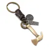 Popular llavero de hacha de aleación retro con colgante tejido de cuero, estilo europeo y americano, llavero de metal personalizado para hombre