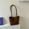 Bolsa casual estilosa de grande capacidade 2026 novo modelo bolsa de ombro casual bolsa de axila padrão trançado bolsa sacola para o dia a dia