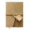 Tarjeta de felicitación plegable navideña hermosa invitación de compromiso invitación de boda hueca láser tarjeta con etiqueta de papel kraft y cordel