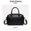 2026 Nova Moda Popular Casual Textura Cor Sólida Portátil Bolsa Boston Feminina Retro Casual Ombro Bolsa Mensageira