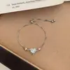 Coleção de pulseiras: borboleta, coração, trevo de quatro folhas, corrente fina simples, versátil para o dia a dia, estilo nicho de alta qualidade, acessórios de menina