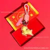 Llavero de oveja de la fortuna del año zodiacal de oro puro 999, correa para teléfono de oveja de flor de dinero de dibujos animados, personalizable y disponible para venta al por mayor