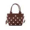 Venta al por mayor transfronteriza 2026 nueva bolsa cruzada de nicho, bolso de mano pequeño de alta gama, bolso para teléfono de lunares, bolso de hombro