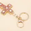 Chaveiro de Cruz Doce e Cool Totalmente Strass Charme de Bolsa com Strass Luxo Leve Estilo Ins Coreano Pingente Pequeno Criativo Presente