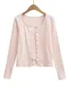 Conjunto de três peças estilo francês: camiseta de manga longa com cardigã de desejo puro + top tipo camisola + saia evasê de cintura alta elástica