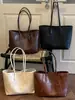 Shuai Mi Jia Moda Estilo Coreano Bolsa Tote Grande Capacidade Feminina 2026 Nova Bolsa de Ombro Simples Casual para Trabalho e Deslocamento