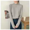 Camiseta base de estilo básico con cuello semi-alto y borde enrollado para mujer Primavera 2026 Otoño/Invierno nuevo estilo suéter temperamento tejido suave y liso