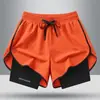 Venta al por mayor del fabricante Exportación transfronteriza Pantalones cortos de seda helada para hombre Verano Tres puntos Pantalones deportivos de playa Secado rápido Correr Fitness Entrenamiento